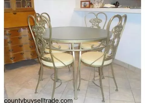 WROUGHT IRON TABLE & 4 CHAIRS
